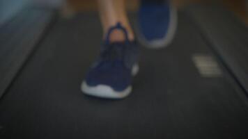 A CloseUp View of Running Shoes in Action on a Treadmill During an Intense Workout Session video