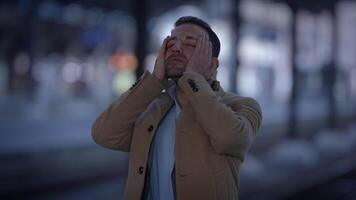 A Man Expressing Deep Emotion While Surrounded by an Urban Setting and Cityscape video
