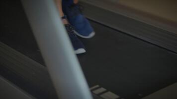 This is a CloseUp Image of Someones Foot on a Treadmill During an Intense Workout Session video