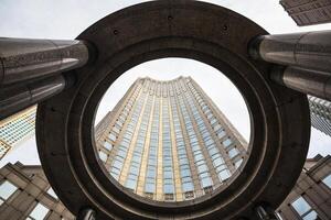 A view of a building from the ground up photo