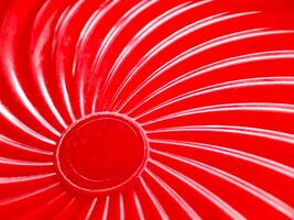 Red glossy abstract background with swirl texture photo