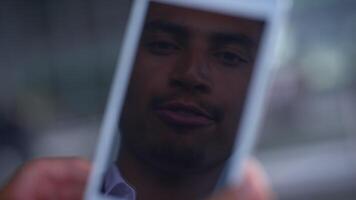 Capturing a Joyful Smiling Moment Reflected in a Smartphones Screen or Reflection video