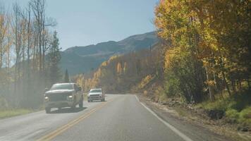 POV Driving Car at Million Dollar Highway during fall season from Ouray to Silverton in southwestern Colorado Offering breathtaking mountain, valley and gorge views video