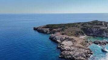 Drone View of Reef Island with Moored Tourist Yachts in Clear Waters video