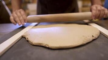 Hands Skillfully Working with Clay during an Engaging Pottery Class Experience in a Studio. Stock Clip video