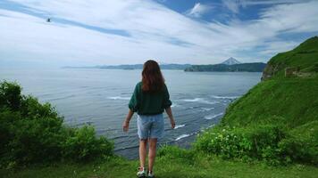 Enjoy Freedom And Beauty Of Nature, Rear View Of Slender Woman Standing On Hill And Put Hands Up video