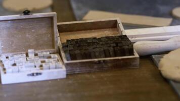 A beautiful collection of vintage wooden letterpress printing blocks and boxes for art and craft. Stock Clip video