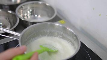 Sweet cream of Camembert cheese. Cake cream. Boil milk chocolate and Camembert cheese in a saucepan, prepare cream for the cake, delicious filling video