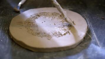 Artisan Clay Craft Making Impressions and Design Patterns on Wet Clay Surfaces and Textures. Stock Clip video