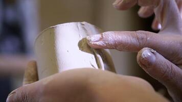 A close up showcasing the intricate craftsmanship of pottery and clay shaping techniques. Stock Clip video