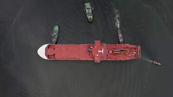 Tugs mooring the ferry that arrived at the port for completion at the shipyard video