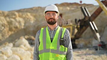 Portrait of builder in uniform at construction site video