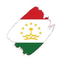 Tajikistan flag in a flat grunge design background vector