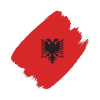 Albania flag in a flat grunge design background vector