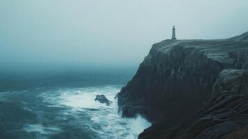 Isolated Lighthouse on Foggy Cliffside Overlooking Stormy Ocean, Dramatic Seascape, Moody Coastal Landscape, Misty Maritime Scene, Waves Crashing on Rocky Shore, Nautical Safety and Guidance photo