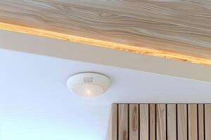 Modern home ceiling with smoke detector and wooden paneling design photo