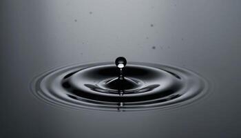 Water Drop Impact. Circular Ripples and Minimalist Grey Tones photo
