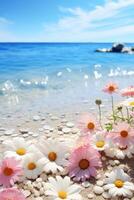Flowers on the beach with blue sky and water photo