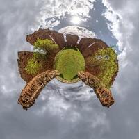 A small planet with a view of a building photo