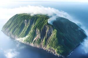 A majestic volcanic island surrounded by the endless ocean, captured from above. Perfect for themes of nature, geography, and unexplored corners of the planet. photo