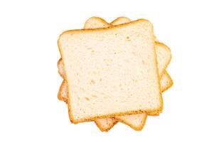 Square Slices of loaf wheat bread for toasts isolated on white background photo