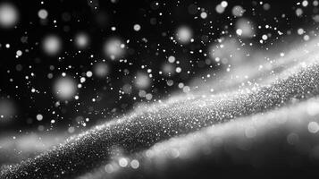 Glittering Abstract Sparkles with Soft Light on Black Background photo