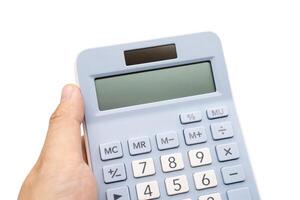 Hand holding Blank Light blue digital calculator on isolated background. Device for calculating the numbers. Copy Space. photo