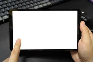 Digital tablet with isolated screen in male hands. digital tablet with empty display. photo
