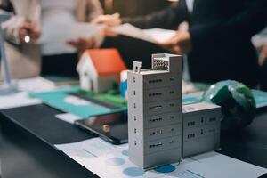 A model of a building is sitting on a table photo