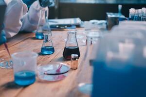 A person in a lab coat is working on a project photo