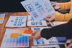 A group of people working on a design project photo
