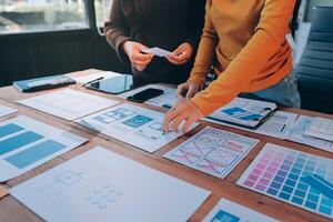 Two people working on a design project photo
