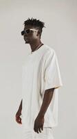 A man in white shirt and sunglasses photo