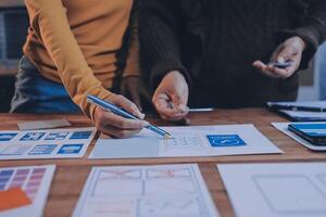 Two people working on a design project photo
