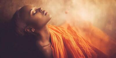 Serene woman in an orange robe, embodying tranquility and peace photo