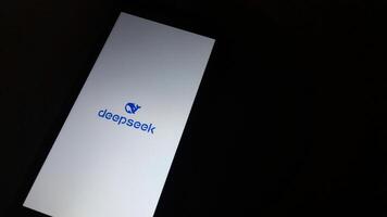 Deepseek AI App Launch Screen on Mobile Device. Bandung, Indonesia, January 22, 2025. photo