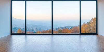 Future lifestyle minimal concept. Modern interior with large windows showcasing an autumn landscape. photo