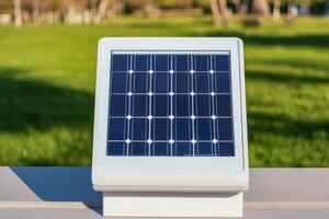 Future lifestyle sustainability connected concept. Solar panel on a stand in a green outdoor setting. photo