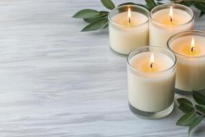 Burnout recovery stress concept. Candles with leaves on a wooden surface create a calming atmosphere. photo