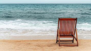 Burnout recovery stress concept. Lone beach chair facing tranquil ocean waves. photo