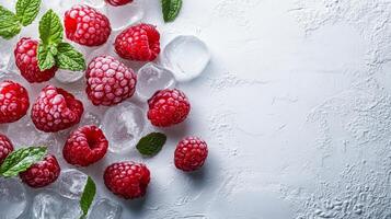 Fresh raspberries with ice cubes on white background photo