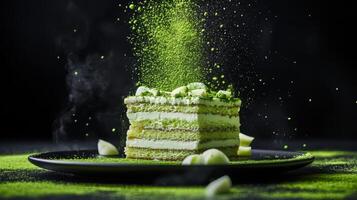 Delicious matcha cake with powdered green tea dust prepared in a dark setting photo