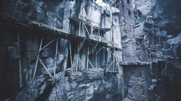 Ancient structure showcases unique architectural remnants in rocky terrain video
