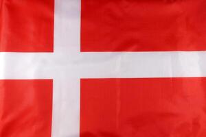 The flag of denmark is shown in this photo
