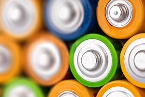 Close Up of Colorful Battery Tops photo