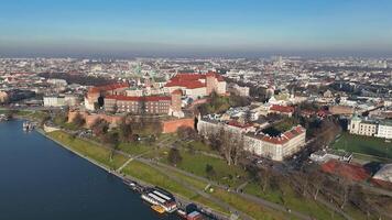 Aerial view of Wawel Castle and Vistula River in Krakow, Poland, Panoramic aerial shot of Wawel Castle, Vistula River, and city landscape video