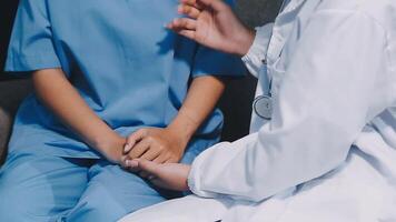 A doctor is talking to a patient video