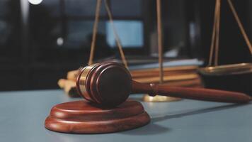 Judge's gavel and scales of justice on a desk video