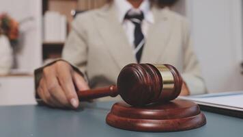 A judge's gavel sitting on a desk video