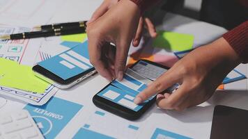 A person is using a smartphone to make a design video